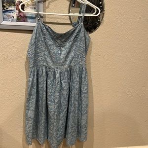 Light blue dress with adjustable straps.